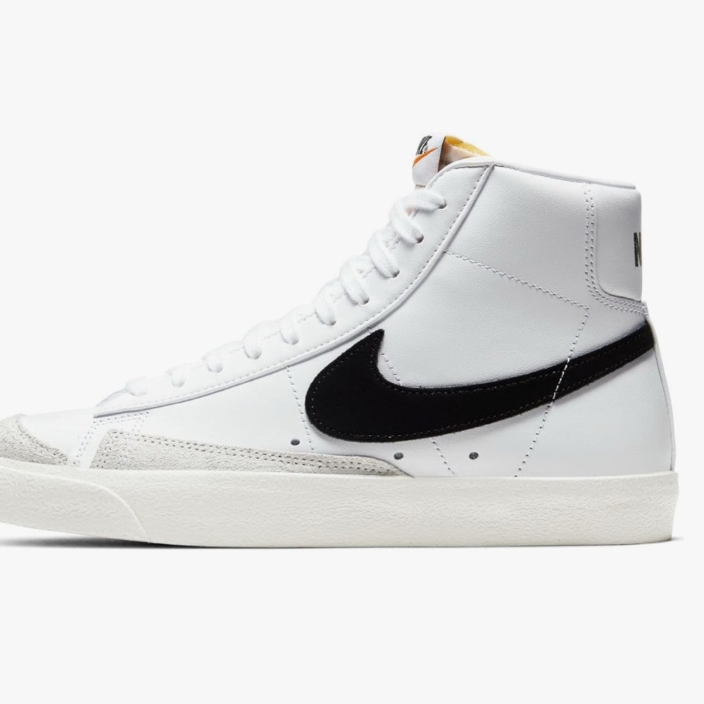 USED Nike women’s White and Black high tops